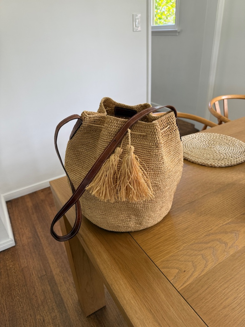 Woven Raffia Bucket Shoulder Bag in Natural Tan with Tassels